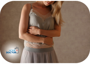 Wrzody żołądka i dwunastnicy – przyczyny, objawy i leczenie kobieta z bolącym brzuchem